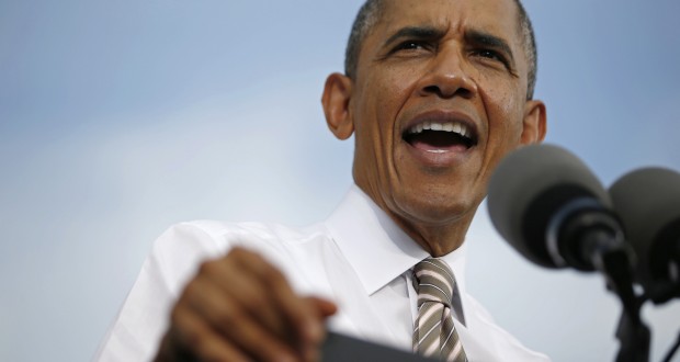 U.S. President Obama delivers remarks on the government funding impasse at a local small business in Maryland