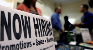In this Thursday, Oct. 25, 2012, photo, a sign attracts job-seekers during a job fair at the Marriott Hotel in Colonie, N.Y. The October employment report the government will release Friday, Nov. 2, 2012 will likely solidify the picture of the U.S. job market thats emerged this year: Companies are hiring steadily but cautiously. And unemployment remains high. (AP Photo/Mike Groll)