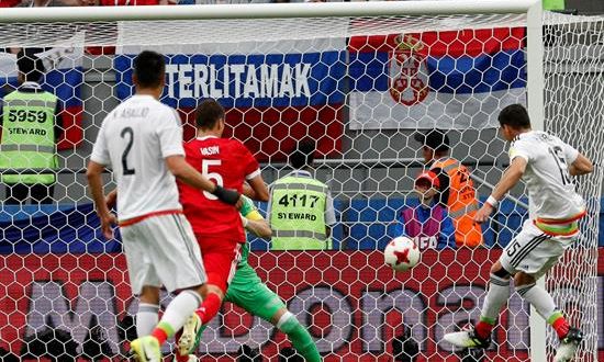 Hector Moreno (R) of Mexico scores a goal which was disallowed later on from the video assistant referee (VAR) due to offside during the FIFA Confederations Cup 2017 group A soccer match between Mexico and Russia at the Kazan Arena in Kazan, Russia, 24 June 2017. (Rusia) EFE/EPA/File